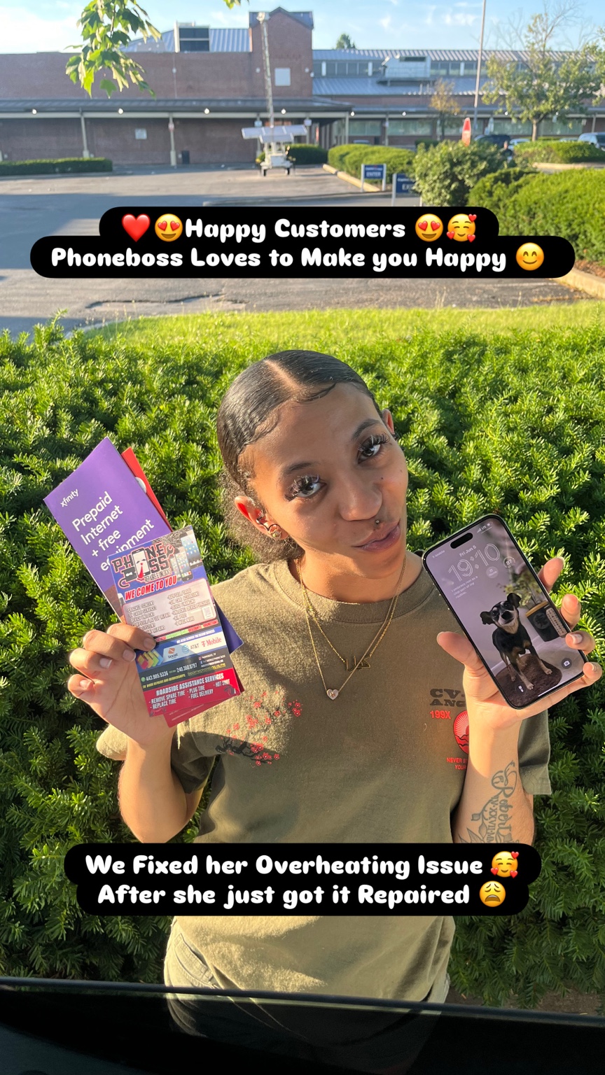 PhoneBoss customer holding a repaired phone