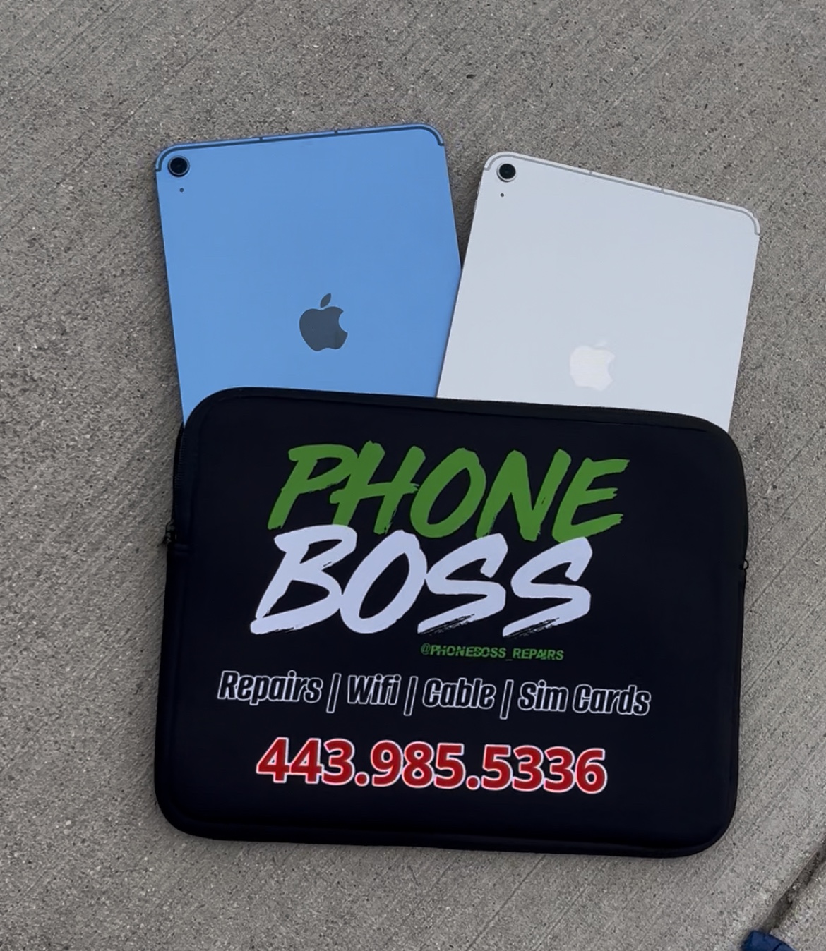 Two iPads displayed with PhoneBoss branding